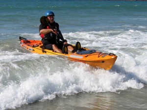 Andy-benham-tarpon-sit-on-top-kayak-surf-landing-300x224
